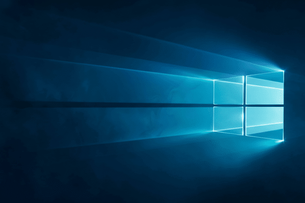 Windows 10 logo glowing in a dark blue background. Filename : windows1 0logo 169 . png