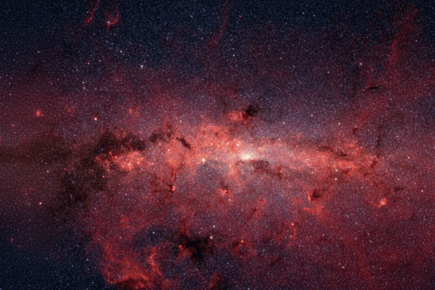 A wide field view of the Milky Way galaxy's center , showcasing a luminous reddish- orange core surrounded by dense fields of stars and cosmic dust in a 16 :9 aspect ratio .