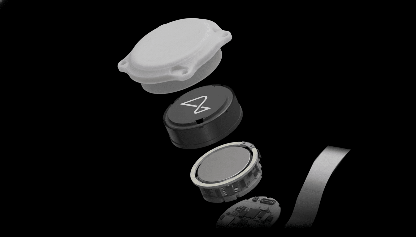 An exploded view of a small, round electronic device, showing its internal components including a white casing , a black central unit with a symbol, a metallic battery or sensor, and a circuit board, all against a dark background.