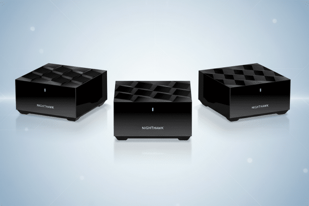 Three black Nighthawk Wi -Fi extend ers arranged on a blue gradient background with subtle abstract patterns. Filename : nighthawk ext endersprofessional .png