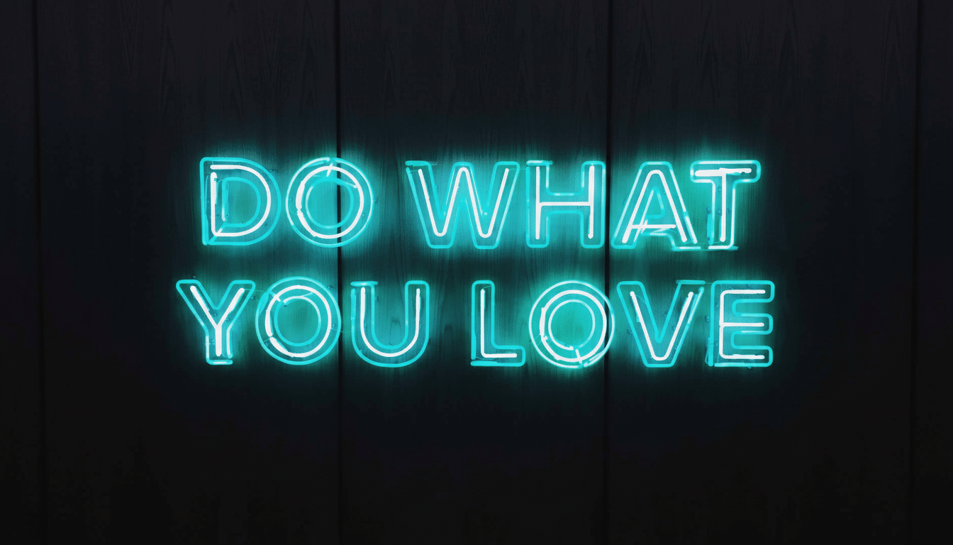 Neon sign displaying DO WHAT YOU LOVE in bright turquoise letters against a dark, textured background.