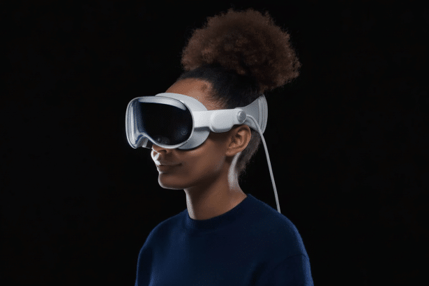 A person with dark, curly hair in a bun wearing white virtual reality goggles with a dark visor and a wire extending from the back. The background is solid black. Filename : person with vrg oggles.png