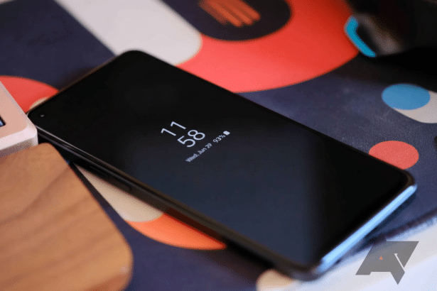 A dark smartphone displaying the time 1 1:58 , Wednesday , June 2 9, and 93% battery