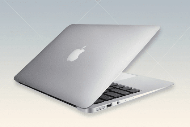 A silver MacBook Air laptop, slightly open, viewed from a three -quarter angle on a professional flat design background with soft gray and beige gradients and subtle geometric patterns. Filename : macbook airprofessional . png