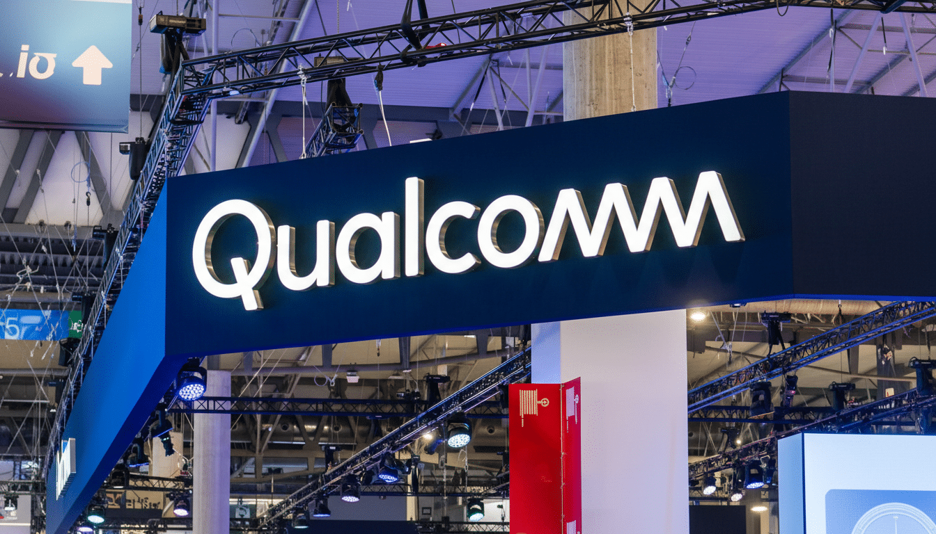 The Qualcomm logo displayed on a large, illuminated sign at a professional event or trade show.
