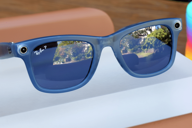 Blue Ray -Ban Stories smart glasses with reflective lenses on a white surface.