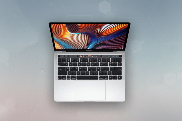 An overhead shot of a silver MacBook Pro with its screen displaying a colorful, abstract wavy pattern, set against a professional light grey background with subtle hexagonal patterns. Filename : macbook prooverhead . png