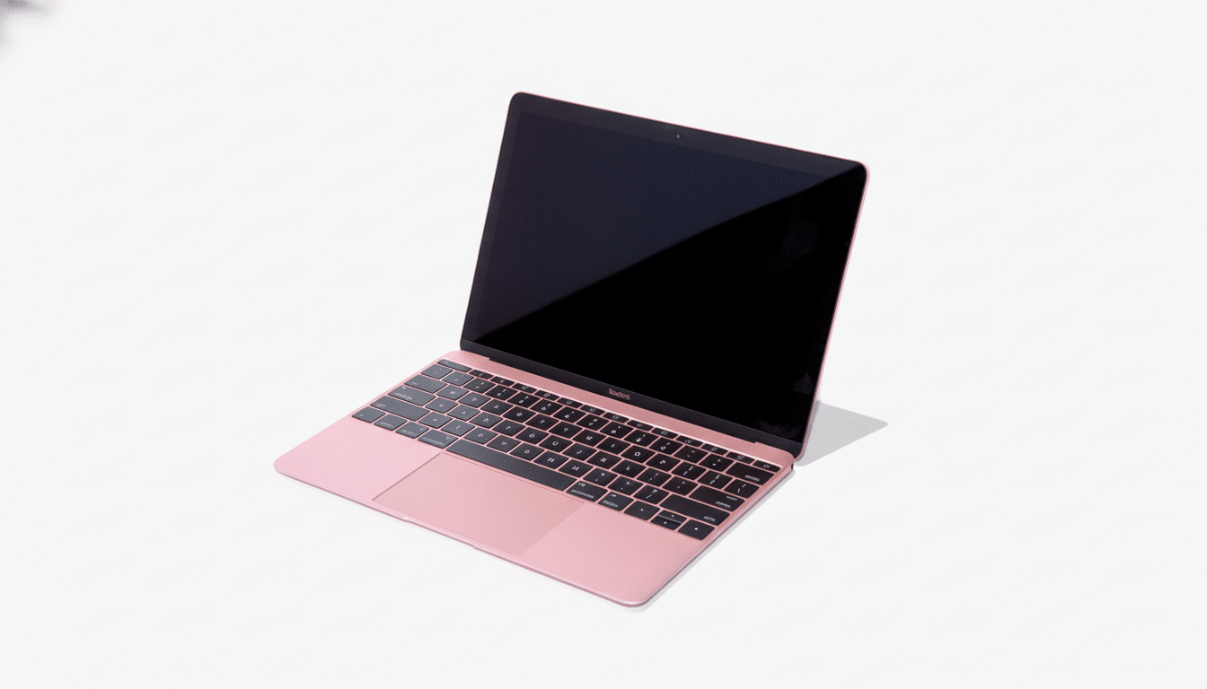 A rose gold MacBook laptop with a black screen and keyboard, viewed from an angle against a white background.