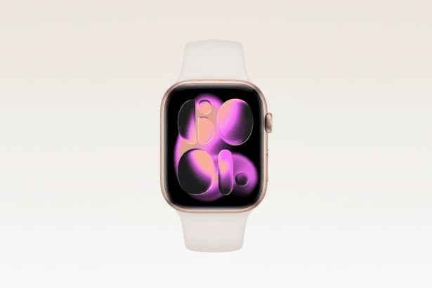 A gold Apple Watch with a white band, displaying a colorful watch face with abstract pink and orange shapes, professionally presented against a soft,