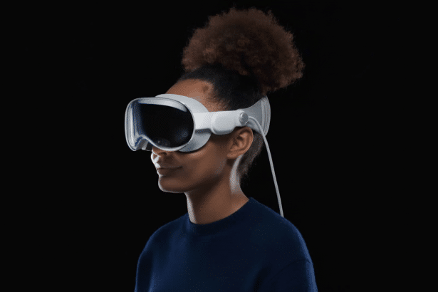 A person with dark, curly hair in a bun wearing white virtual reality goggles with a black visor , looking slightly to the right against a black background. Filename : person wearingvr goggles. png