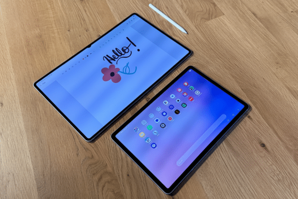 Two tablets on a wooden surface, one displaying Hello! and a flower , the other showing app icons, with a stylus nearby .