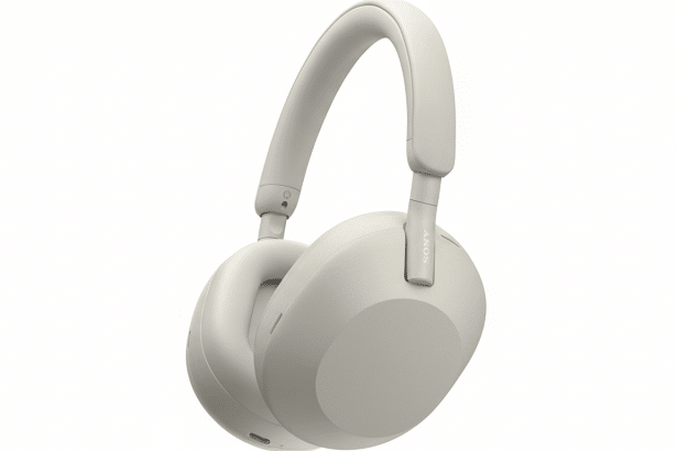 A pair of beige Sony WH-1 000XM 5 wireless noise-canceling headphones, shown at an angle, with a clean white background. Filename : sonywh 1 000xm 5headphones. png
