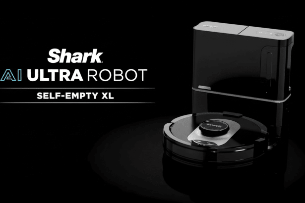 A professional image of the Shark AI Ultra Robot Self- Empty XL, a black robotic vacuum cleaner with a self -empt ying base, displayed against a dark background with subtle reflections .