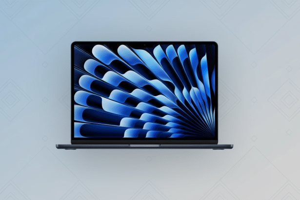 A professional shot of a dark blue MacBook Air with a vibrant blue and black abstract wallpaper, presented on a light blue gradient background with subtle diamond patterns , resized to a 1 6:9 aspect ratio. Filename : macbook airprofessional 169 . png