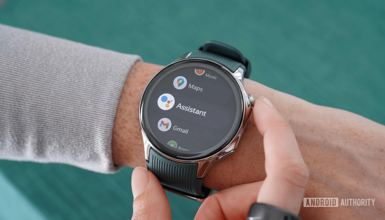A close -up shot of a smartwatch on a person's wrist, displaying app icons for Music , Maps, Assistant , and Gmail on its screen .
