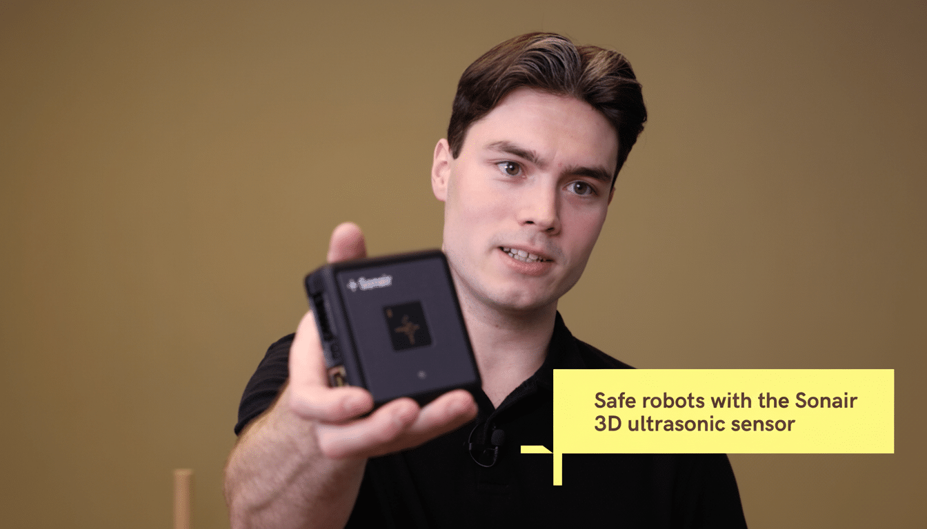 A man presenting the Sonair 3D ultrasonic sensor. Filename : man presenting sonair3 dultr asonicsensor. png