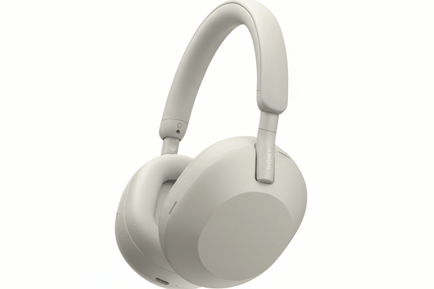 A pair of off -white Sony WH -1 000XM 5 wireless noise-canceling headphones on a pure white background, showcasing their sleek design.