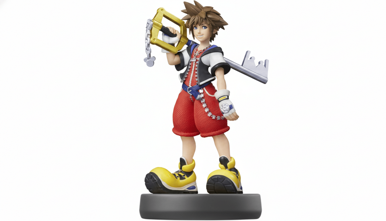 A Sora Ami ibo figure from Kingdom Hearts standing on a black base, holding a golden Key blade with a silver keychain, set against a plain white backg
