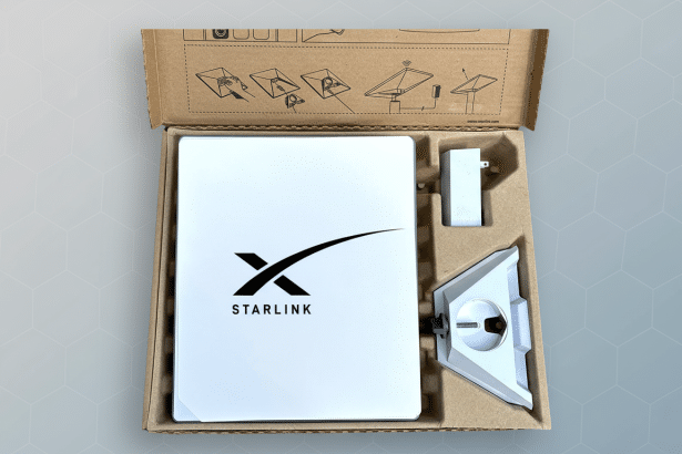 A Starlink satellite internet kit with the dish and stand in its original packaging , resized to 16:9 aspect ratio and enhanced , with a professional flat background .