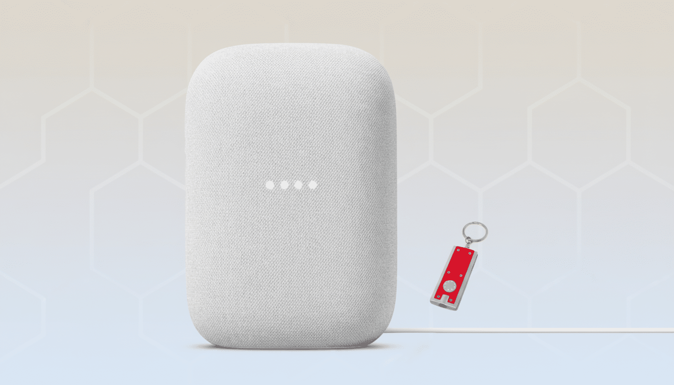 A white Google Nest smart speaker with an attached cable and a red and silver keychain with a white ring on a background with soft gradient and hexagonal patterns.