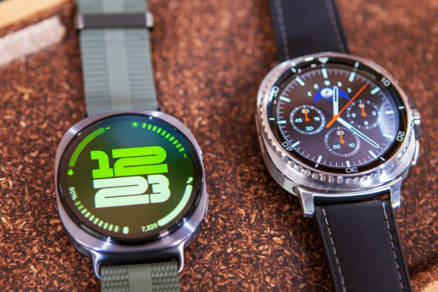 Two smartwatches, one with a digital display showing time and steps , and another with an analog chronograph face, resting on a textured brown surface. Filename : smartwatches 169 . png