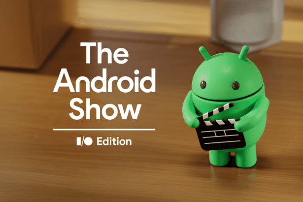 A 16: 9 aspect ratio image for The Android Show I/O Edition featuring the green Android robot holding a cl apperboard on a wooden surface.