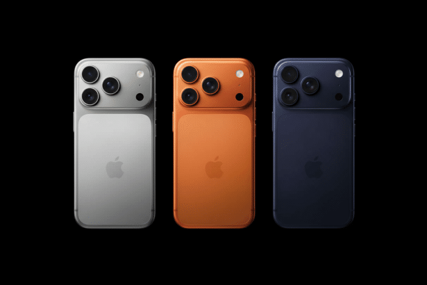 Three smartphones , one silver, one orange, and one dark blue, arranged horizontally against a black background, showcasing their camera systems and Apple logos .