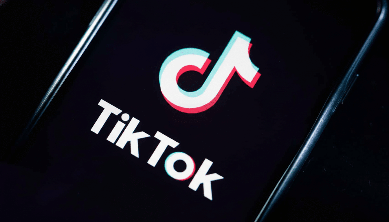 The TikTok logo displayed on a smartphone screen, resized to a 1 6:9 aspect ratio while maintaining the original dark background. Filename : tiktoklogo smartphone 16 9. png