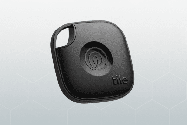 A black Tile Mate tracker on a professional flat design background with a subtle honeycomb pattern and soft gray gradient.