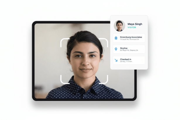 A professional screen displaying a woman' s face within a facial recognition interface , with a visitor pass for Maya Singh from Greenburg Associates shown on the side .