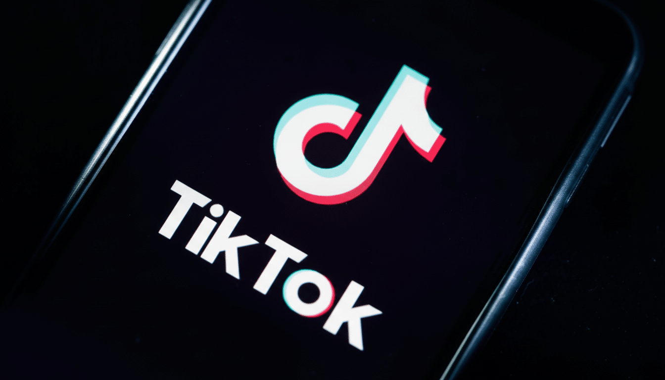 lt Text : The TikTok logo displayed on a smartphone screen, resized to a 1 6:9 aspect ratio and prof