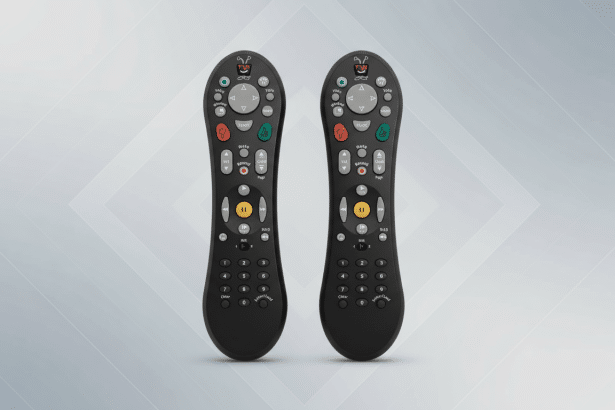 Two black remote controls, identical in design and button layout, are presented side-by- side on a light gray background with a subtle geometric pattern. The rem otes feature various buttons for navigation , channel control, volume, and DVR functions, with prominent red, green , and yellow buttons . The background is a gradient from light to medium gray, enhancing the professional and clean presentation of the remotes.
