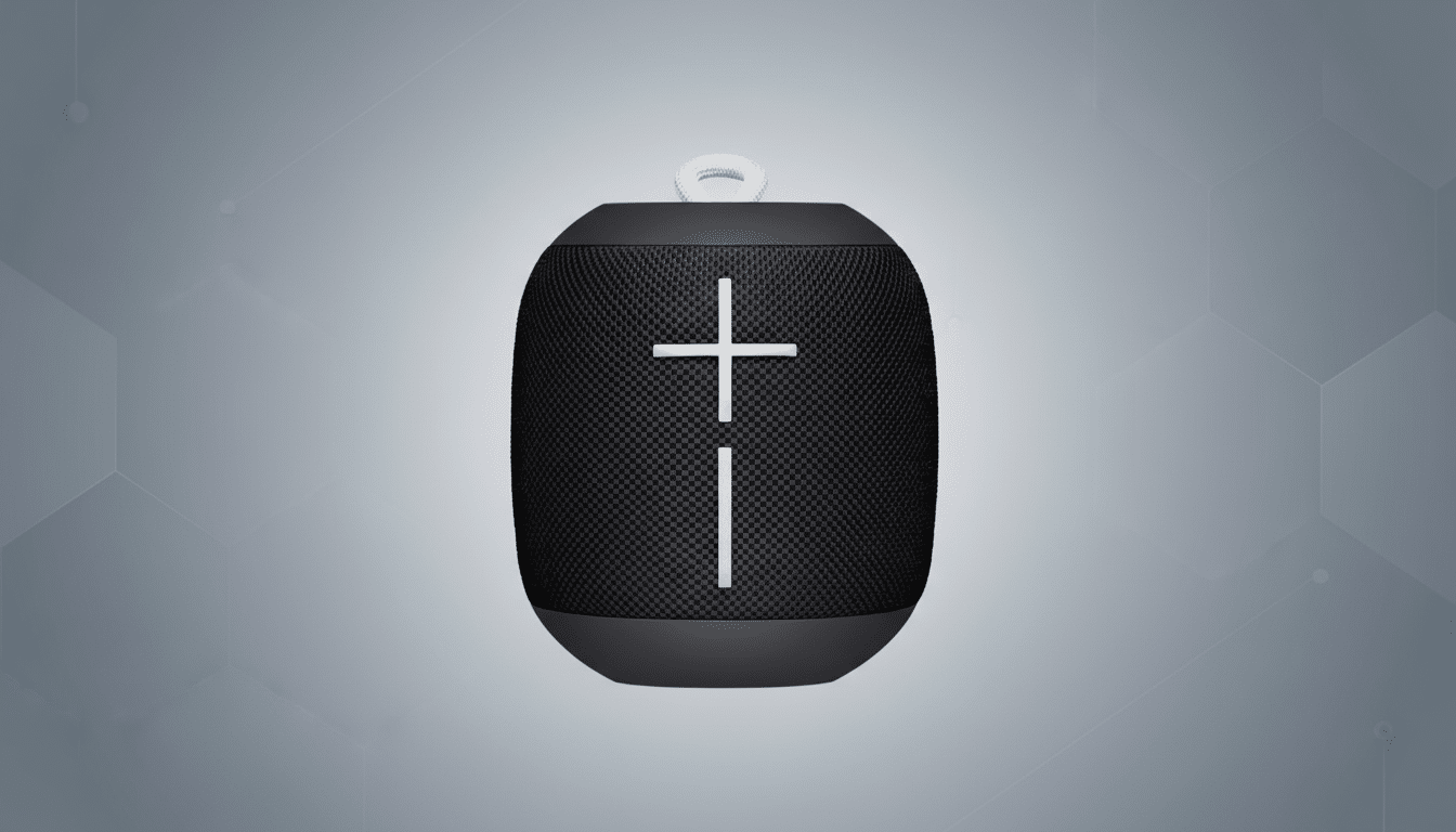 A professional shot of a black portable speaker with volume controls on the front, set against a subtle , light gray geometric pattern background. Filename : black portablespeaker . png