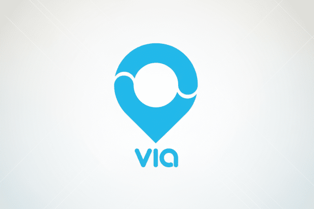 The Via logo, a light blue location pin icon with a circular opening at the top and the word VIA in light blue text below, set against a subtle light