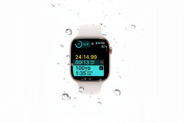 An Apple Watch with a white band is shown against a plain white background with water droplets. The watch display shows workout metrics including time, distance, and pace .