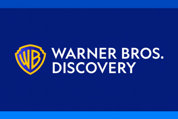 The Warner Bros. Discovery logo, featuring the gold and blue WB shield next to the white text WARNER BROS. DIS COVERY on a plain blue background, resi