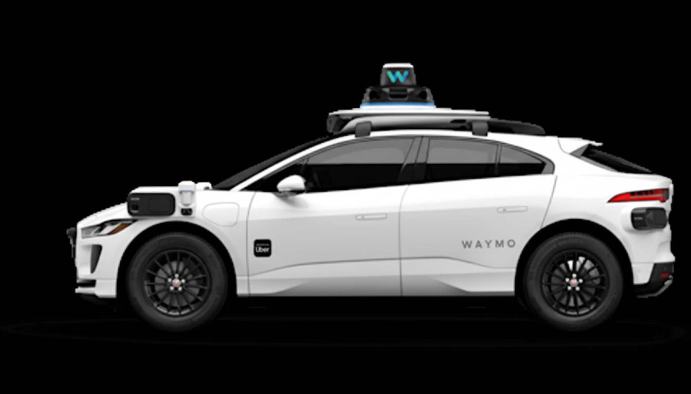 A white Waymo self-driving car with Uber branding on its side, presented against a black background.