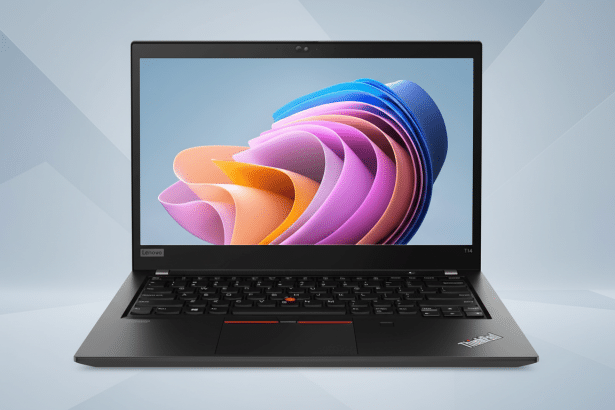 A black Lenovo ThinkPad T 14 laptop with a colorful abstract wallpaper displayed on its screen, set against a professional light grey background with