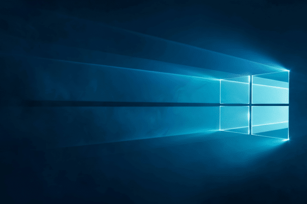 The Windows logo rendered in bright blue light emanating from a dark background, resized to a 16: 9 aspect ratio.