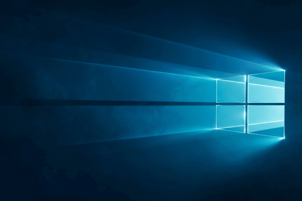 Windows 10 logo glowing blue on a dark background Filename: windows 10logo enhanced .png