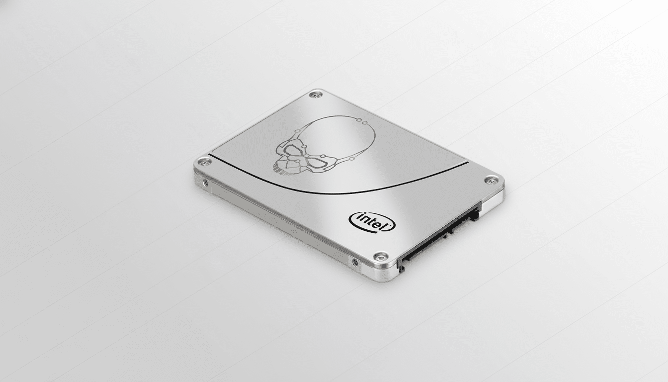 An Intel solid - state drive (SSD ) with a skull logo, presented on a subtle grey gradient background. Filename : intelssd skulllogo . png