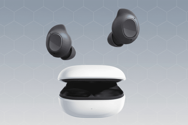 A pair of dark gray wireless earbuds floating above their open white charging case , presented on a light gray background with a subtle hexagonal pattern.