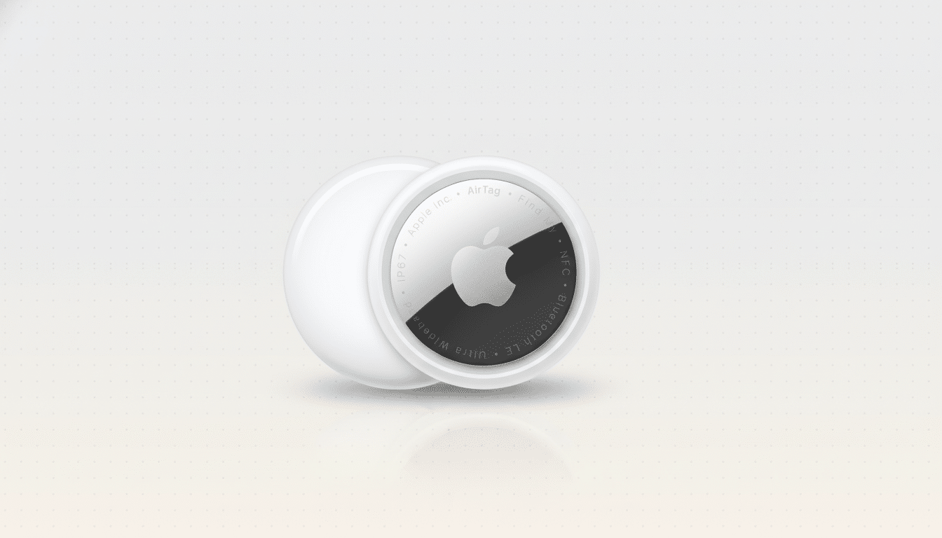 An Apple AirTag, a small white and silver circular tracking device, is presented on a professional light gray background with a subtle dotted pattern.