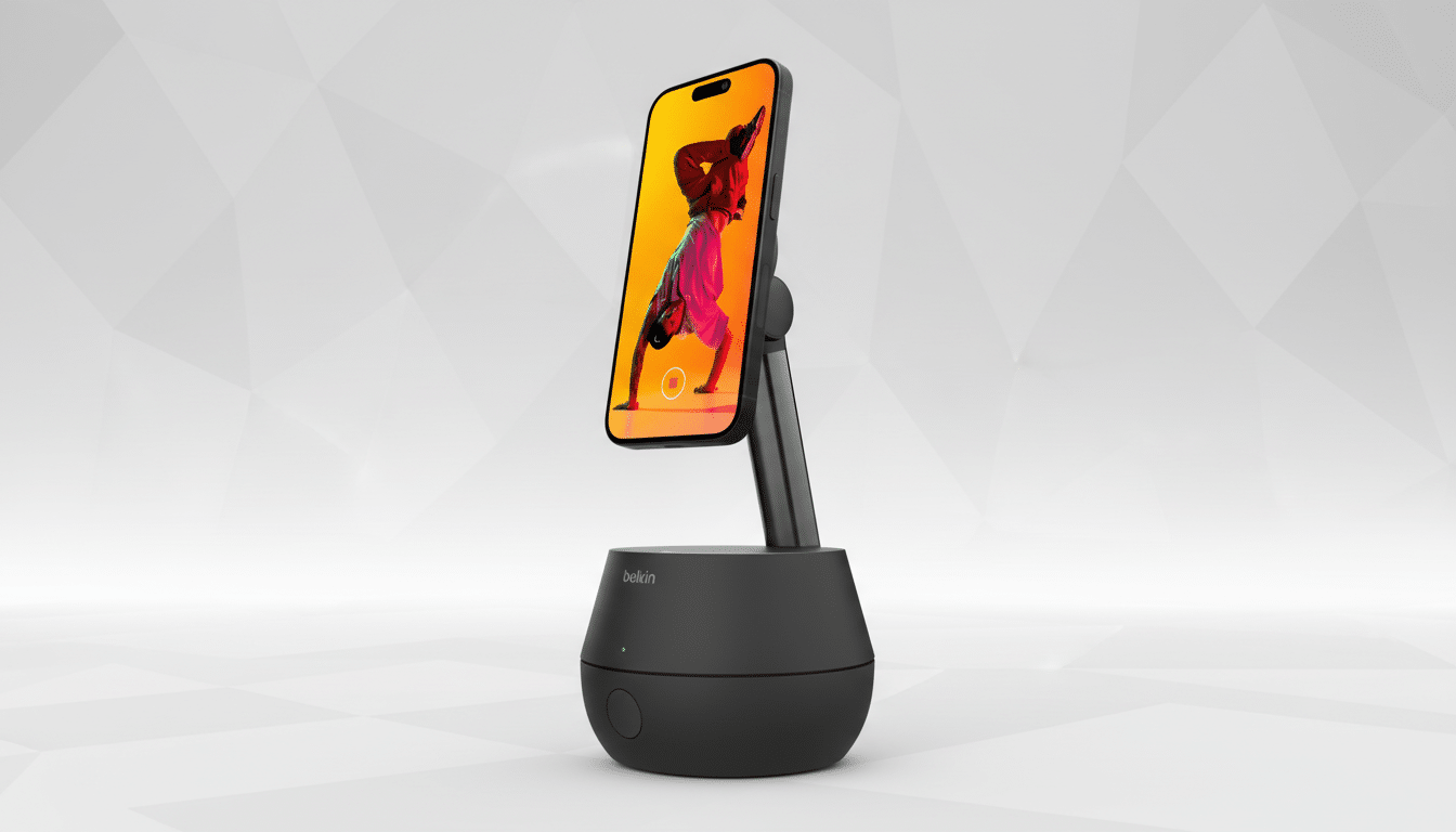 A black Belkin phone stand holding a smartphone displaying a person doing a handstand, set against a professional flat design background with soft patterns.