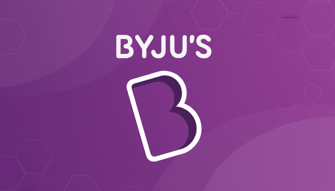 The Byjus logo, featuring the word BYJUS in white text above a stylized white B outline, set against a purple background with subtle, soft hexagonal patterns and gradients, resized to a 16:9 aspect ratio.
