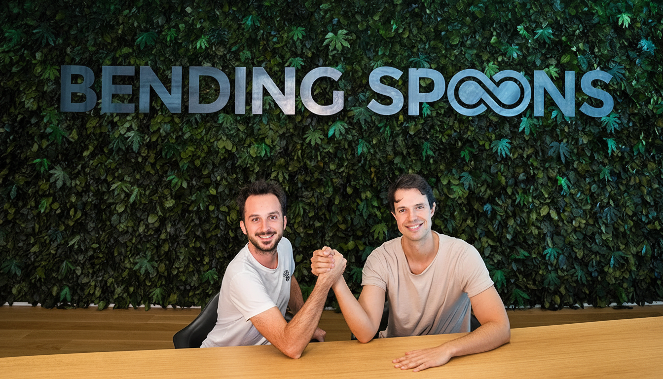 Two men arm wrestling at a wooden table in front of a green wall with the BENDING SPOONS logo.
