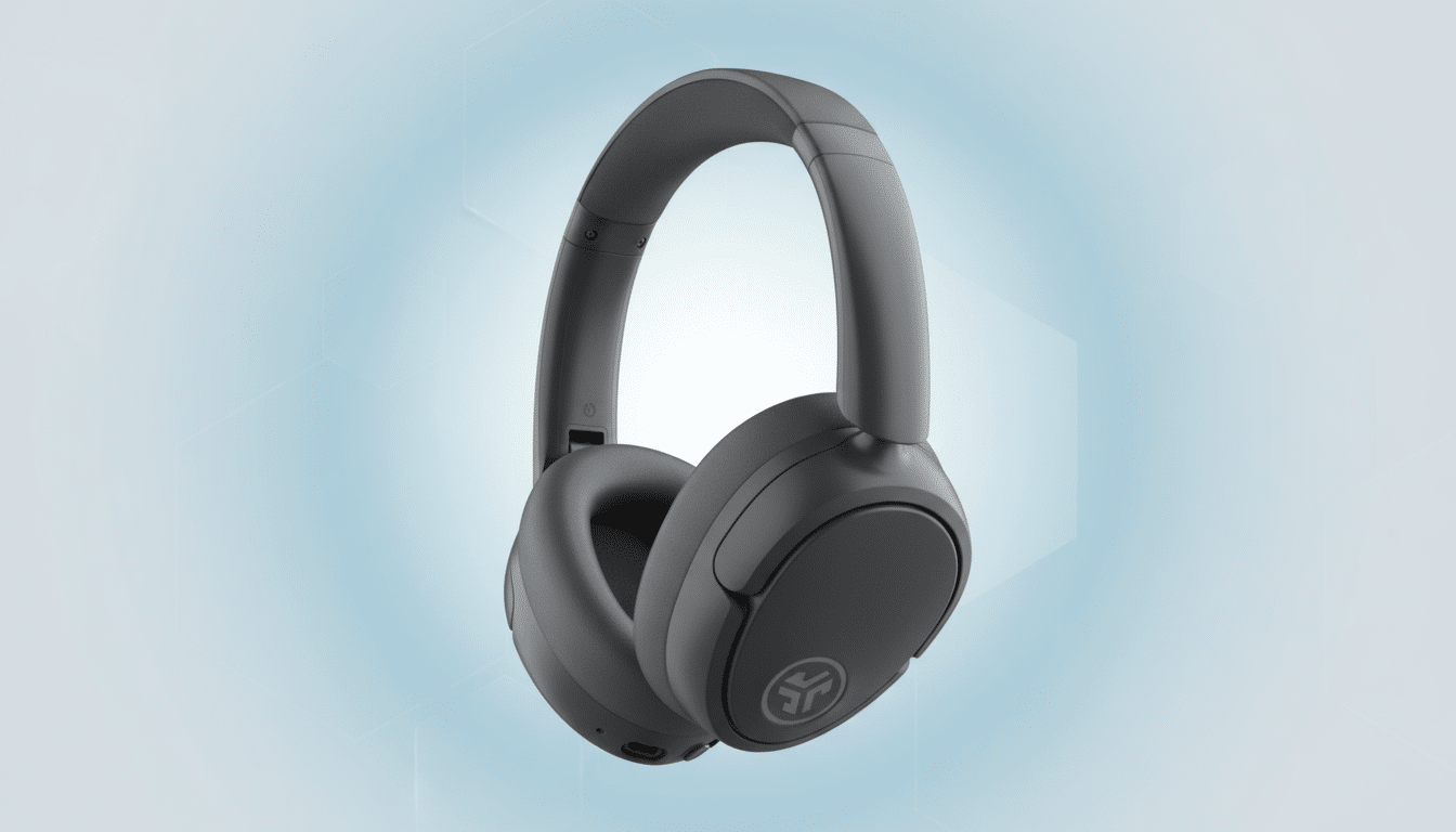 A pair of dark gray over-ear headphones with a subtle logo on the earcup, presented against a light blue background with soft, geometric patterns.