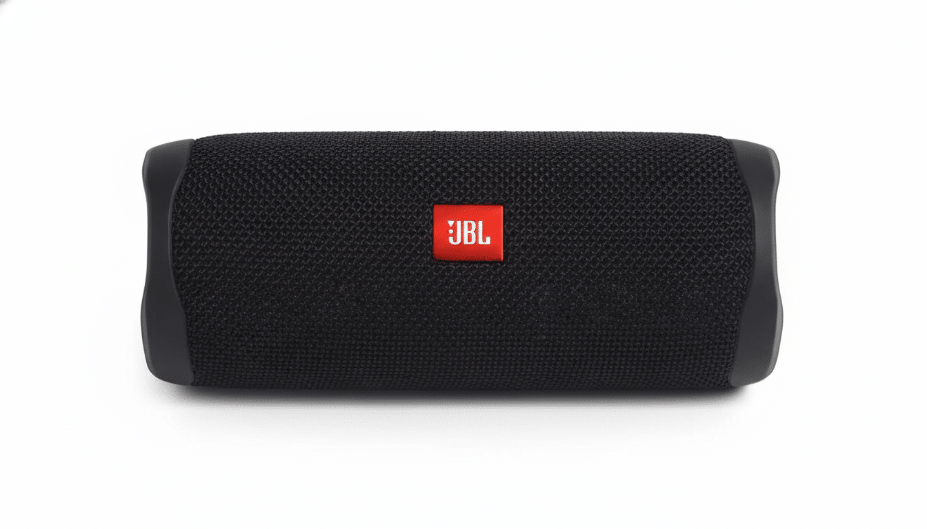 A black JBL Flip 5 portable Bluetooth speaker with a red JBL logo, presented on a clean white background.