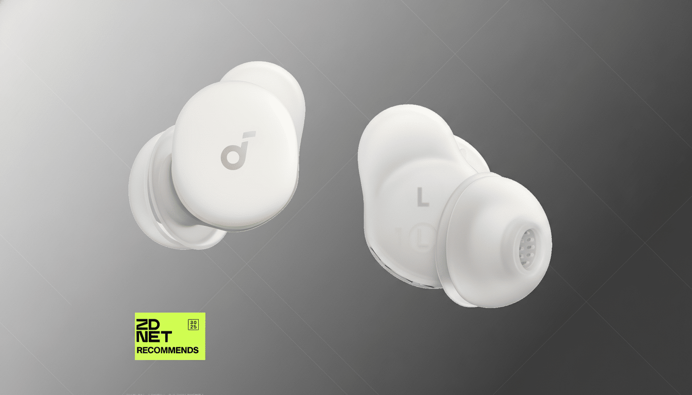 A pair of white Anker Soundcore earbuds, with the left earbud showing the Soundcore logo and the right earbud showing an L for left, set against a professional gray gradient background with a ZDNET RECOMMENDS badge in the bottom left corner.