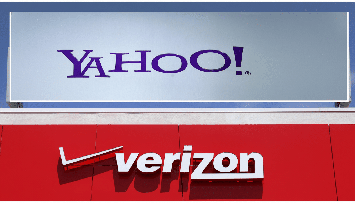 A 16:9 aspect ratio image showing the Yahoo! logo on a silver sign above the Verizon logo on a red sign.